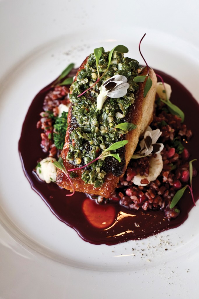 The fish is always a welcome surprise at Luma. Here, golden seared flounder is served with red wine-pomegranate butter and mint salsa verde along with red rice and haricot vert.